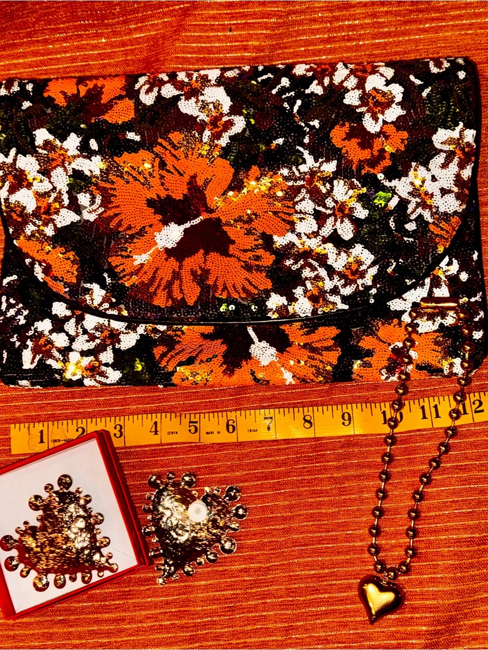 New Orange Floral Sequin Clutch paired w/golden heart earrings & heart necklace